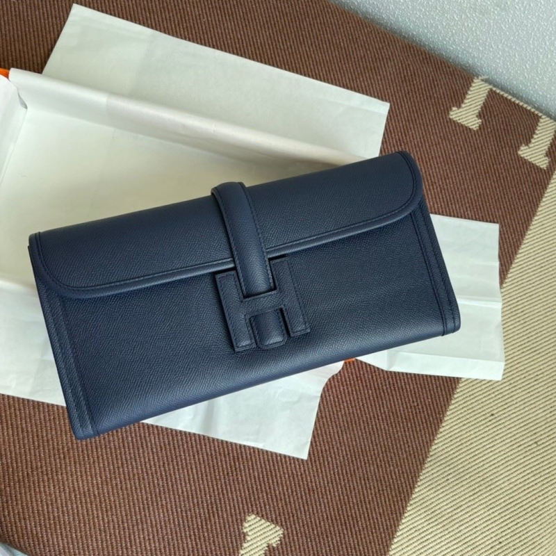 H**mes clutch bags